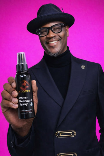 Founder of Life Change Products holding StayPut hair spray