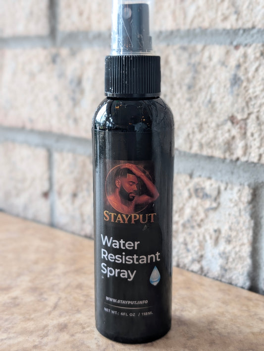 Stay put water resistant spray